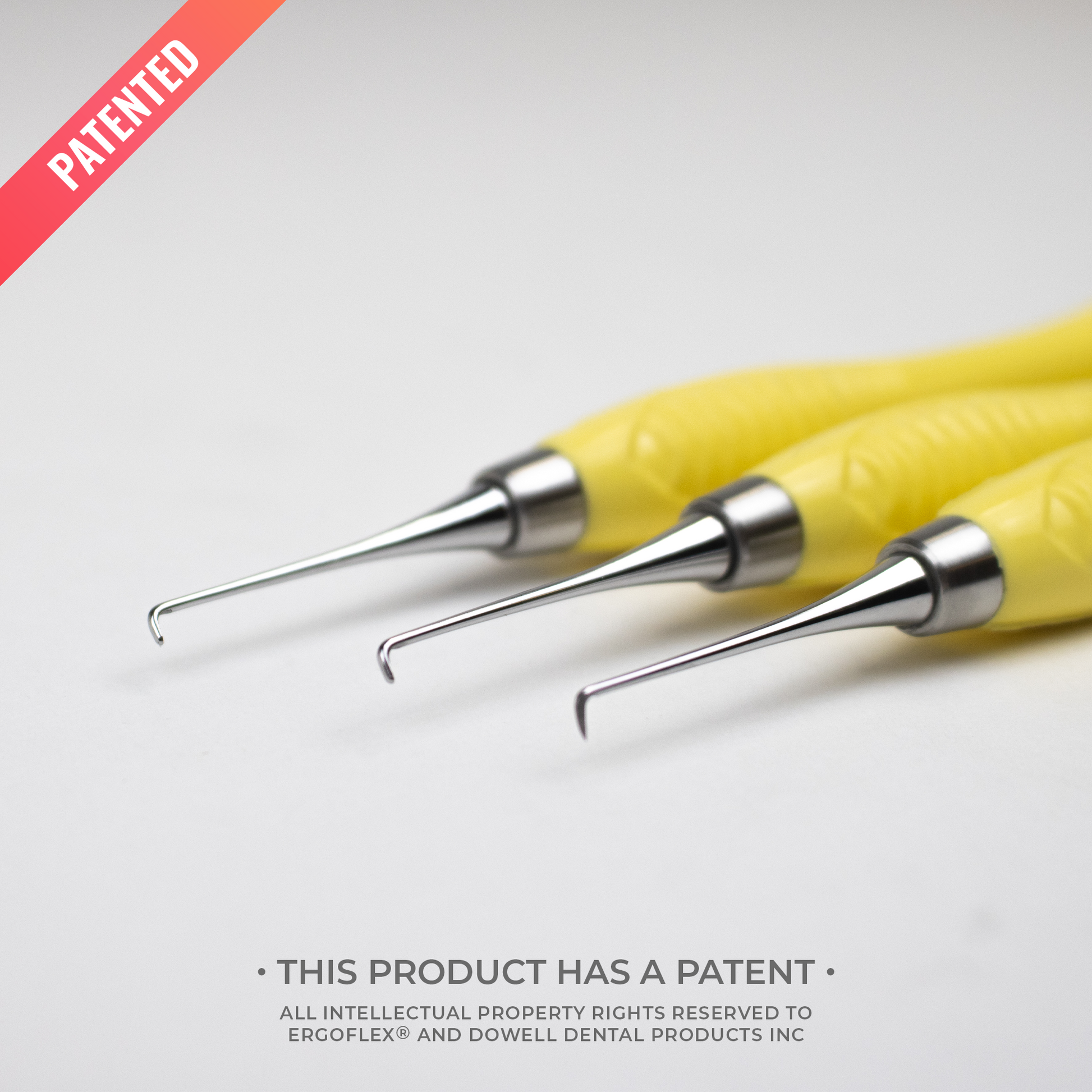 Three yellow dental instruments with metal ends on a light gray background, featuring the word 'Patented'.
